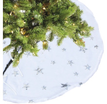 Weihnachtsbaumdecke mit silbernen Sternen aus weichem Stoff unter einem geschmückten Tannenbaum.