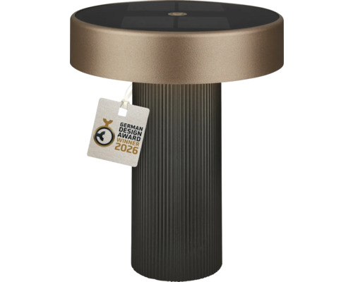 Lampe de table solaire moderne avec socle nervuré, abat-jour rond plat, panneau solaire intégré et German Design Award Winner 2026.