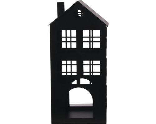 Lanterne noire en métal en forme de maison avec plusieurs fenêtres et une ouverture en arcade.