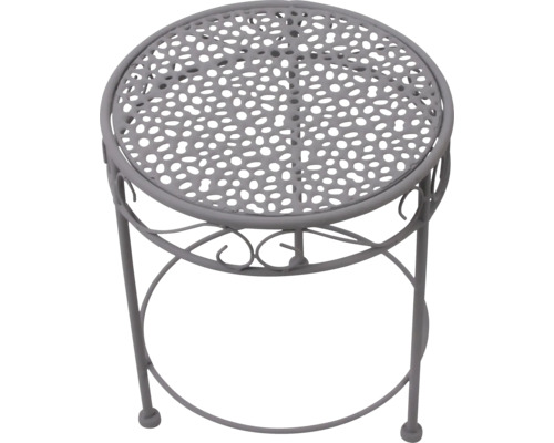 Runder Gartentisch aus Metall in Grau mit gelochter Tischplatte und dekorativen Verzierungen.
