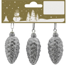 Drei Christbaumschmuck-Anhänger in Zapfenform mit silberner Glitzer-Oberfläche.