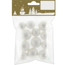 Petites boules de Noël blanches en plastique avec des paillettes dans un sachet de Geroma.
