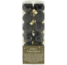 Schwarze Christbaumkugeln aus Glas mit glänzender, matter und strukturierter Oberfläche in einer transparenten Verpackung.