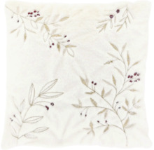 Coussin décoratif avec motif de branches et de baies brodé sur une peluche douce.