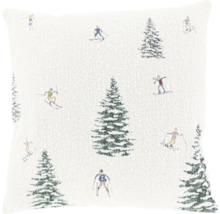 Coussin décoratif carré avec motif hivernal tissé composé de sapins et de skieurs.