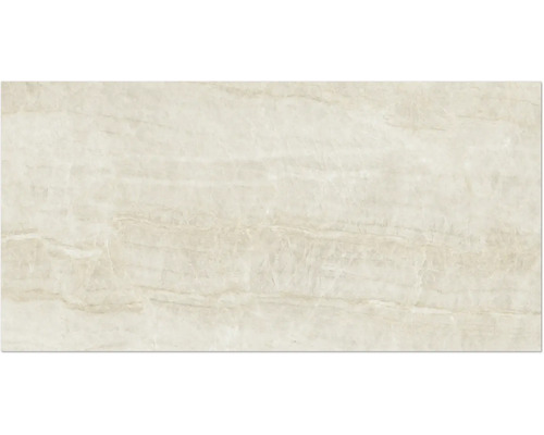 Carreau en grès cérame aspect pierre naturelle beige, surface structurée.