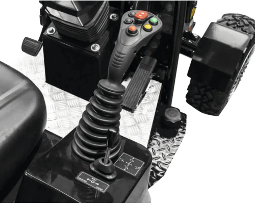 Commandes d'un engin de chantier avec un joystick multifonction, des boutons et un levier de verrouillage sur une plaque antidérapante.
