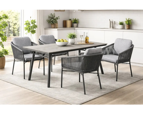 Ensemble de salle à manger moderne avec table rectangulaire effet bois, cadre en métal et quatre fauteuils en corde tressée avec coussins.