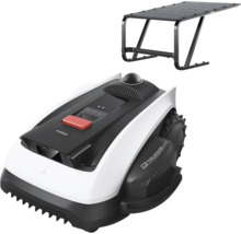 Mähroboter mit Garage in Schwarz und Weiß, mit rotem Stopp Knopf und Geländereifen.