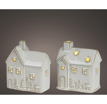 Deux petites maisons décoratives en céramique avec éclairage LED, reliefs hivernaux et ouvertures en forme de cœur et d'étoile.