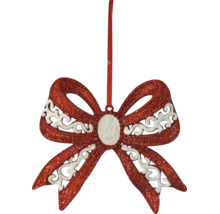 Christbaumschmuck Schleife mit rotem Glitzer und weißem Schnörkelmuster.
