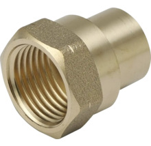 Réducteur en laiton avec filetage femelle et profil hexagonal.