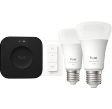 Philips Hue Starter Set mit Bridge, Dimmer Schalter und zwei White and Color Ambiance 1100 LED Leuchtmitteln E27. Philips Logo und Hue Logo.