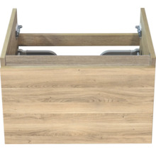 Meuble sous-vasque à l'aspect bois avec découpe pour siphon et ferrures métalliques