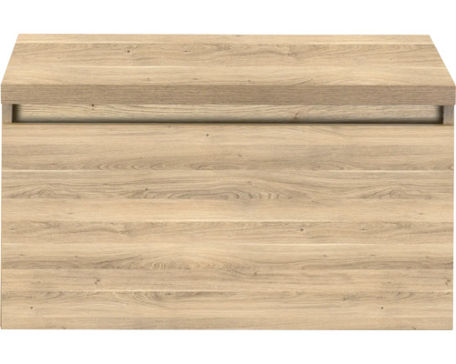 Möbelfront in Eichenoptik mit integrierter Griffmulde und horizontaler Holzmaserung.