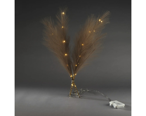 Herbe de la pampa artificielle avec éclairage blanc chaud à piles pour la décoration.