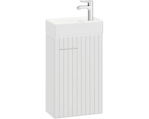 Gäste-WC-Waschtisch mit Waschbecken, Armatur und Unterschrank mit gerillter Front und verchromtem Griff.