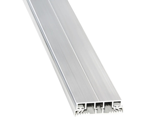 Profilé en aluminium pour revêtements de sol avec face inférieure rainurée.