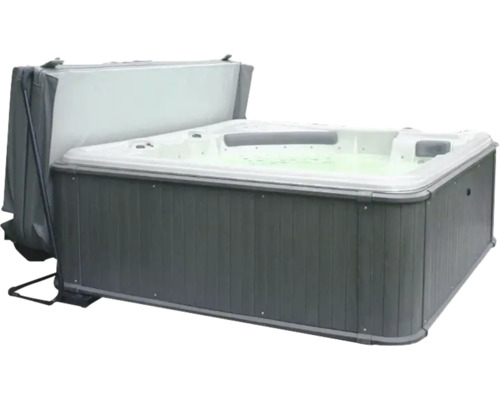Rechteckiger Whirlpool mit grauer Außenverkleidung, weißer Innenschale, Kopfstützen und geöffneter Abdeckung.