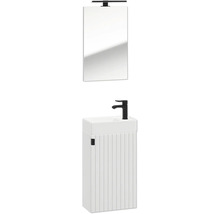 Gästebad-Möbelset mit weißem, gerilltem Unterschrank, Keramikbecken, schwarzer Armatur, Spiegel und schwarzer LED-Leuchte.