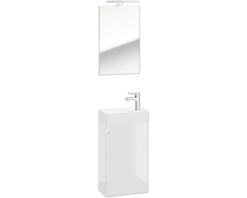 Gäste-Badmöbelset bestehend aus Waschbecken, Unterschrank, Armatur und Spiegel mit Beleuchtung.