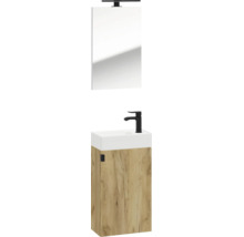 Gästebad-Set bestehend aus Waschbeckenunterschrank in Eichenoptik, weißem Waschbecken, schwarzer Armatur und Spiegel mit LED-Beleuchtung.