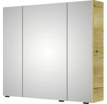 Armoire de toilette à trois portes pour la salle de bain avec corps en aspect chêne et façades en miroir.