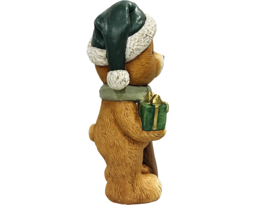 Weihnachtsfigur Teddybär mit grüner Nikolausmütze, grünem Schal und kleinem Geschenkpaket.