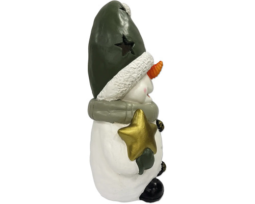 Schneemann-Figur mit grüner Mütze und goldenem Stern, winterliche Weihnachtsdekoration.