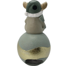 Figurine de Noël en céramique, élan assis sur une boule avec une bande dorée.