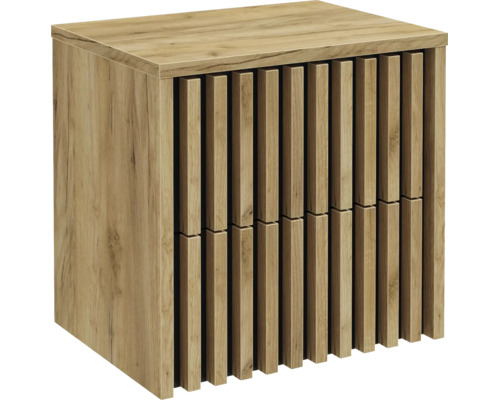 Meuble sous-vasque aspect bois avec lamelles verticales sur la face avant.