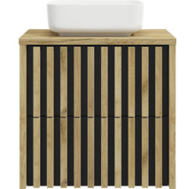 Meuble sous-vasque moderne aspect chêne avec lattes de bois verticales sur fond noir et vasque à poser blanche.