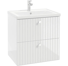 Weisser Waschtischunterschrank mit gerillten Schubladenfronten, Waschbecken und Armatur.