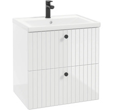 Weisser Waschbeckenunterschrank mit zwei Schubladen im Rillendesign, runden Knöpfen und weissem Waschtisch mit schwarzer Armatur.