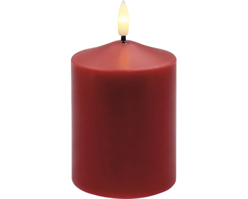 Rote LED-Stumpenkerze mit künstlicher Flamme.