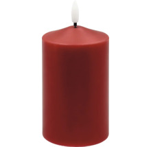 Rote LED-Stumpenkerze mit künstlicher Flamme.