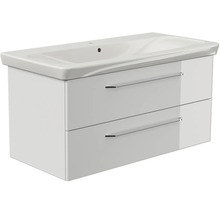Badmöbel-Set mit Keramik-Waschtisch und Waschbeckenunterschrank mit zwei Schubladen und Metallgriffen.