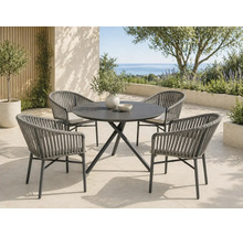 Ensemble de jardin moderne composé d une table ronde et de quatre fauteuils en corde tressée sur une terrasse lumineuse avec vue sur la mer.