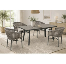 Salon de jardin moderne comprenant une table rectangulaire et quatre fauteuils en corde tressée avec coussins dans un espace de vie lumineux.