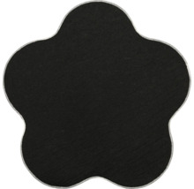 Schwarze blumenförmige Matte aus Textil mit umsticktem Rand.