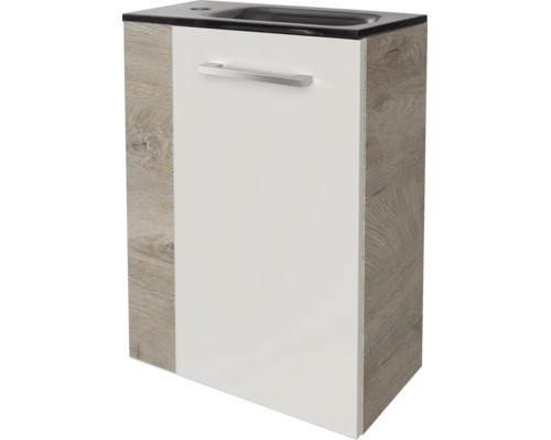 Meuble sous-vasque pour toilettes invités avec façade blanche, côtés aspect bois et vasque intégrée.