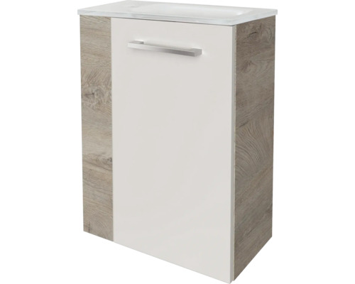 Meuble sous-vasque avec façade blanche, corps en aspect bois et vasque intégrée avec poignée métallique.