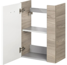 Meuble haut avec corps aspect chêne, porte blanche et une étagère.