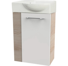 Ensemble lave-mains pour WC d'invités avec vasque en céramique et meuble sous-lavabo aspect chêne avec façade blanche.