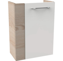 Meuble de salle de bain avec façade blanche, côtés à l'aspect bois et une poignée en métal argenté.