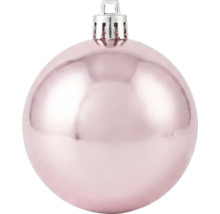 Glänzende rosa Weihnachtskugel mit silberner Aufhängung.