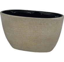 Cache-pot ovale avec surface texturée et intérieur sombre.