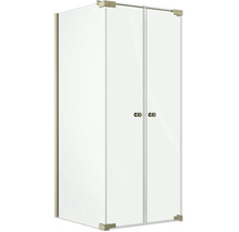Cabine de douche d'angle en verre clair avec double porte pivotante et ferrures dorées.