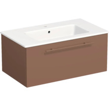 Meuble sous-vasque avec lavabo en céramique blanche, meuble suspendu brun avec un tiroir et poignée horizontale.