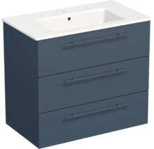 Meuble sous-vasque bleu pétrole avec trois tiroirs et vasque en céramique blanche.